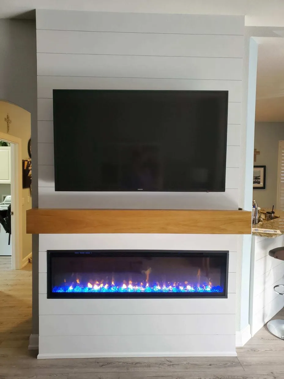 Custom linear fireplace with shiplap surround